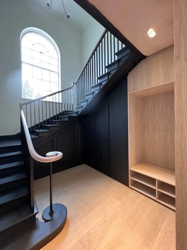 custom wooden staircase with storage